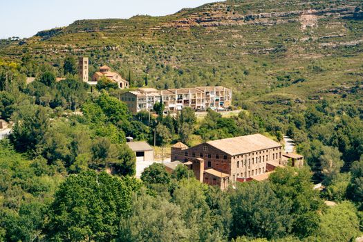Explore the lush greenery and historic sites of Catalonia, Spain, in a stunning landscape view.